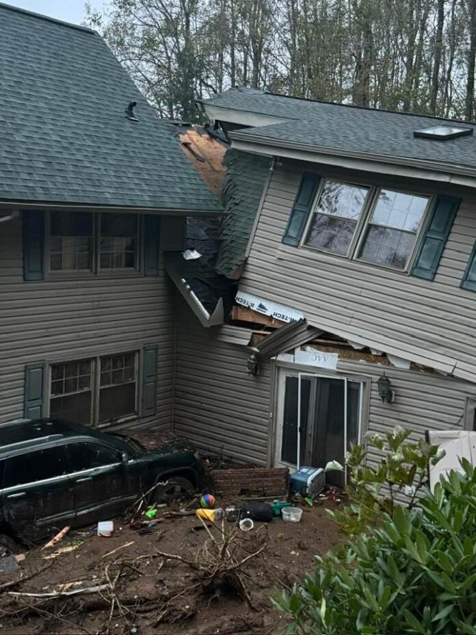 A storm-damaged home in the town of Newland, N.C. near Banner Elk. [Photo: Mindy Kent/Facebook]