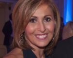 Is Flora Posteraro A Victim Of Discrimination, Or Reorganization?