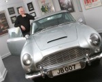Selling vehicles to middle-aged television fans Jerry Lee with the James Bond car