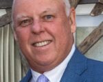 Ex-WBZ TV Head Resurfaces At Regan Mark Lund