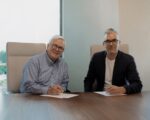 K-LOVE Goes Global With Trans World Radio Partnership K-LOVE CEO Tom Stultz, TWR President & CEO Andy Schick