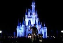 ‘Under Protest,’ Disney Files Early ABC TV License Renewal Forms Walt Disney World Magic Kingdom lit up at night