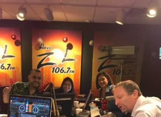 How America Listens, According to Nielsen Audio RBR+TVBR Editor-in-Chief Adam R Jacobson hams it up inside the studio of SBS's WXDJ-FM in Miami.