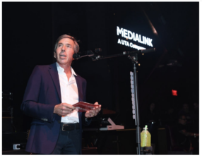 Rich Bressler, President, COO and CFO of iHeartMedia addresses attendees at an executive dinner party hosted by iHeartMedia and MediaLink, in partnership with Meta, at Zouk Nightclub in Resorts World during the 2024 Consumer Electronics Show in Las Vegas.